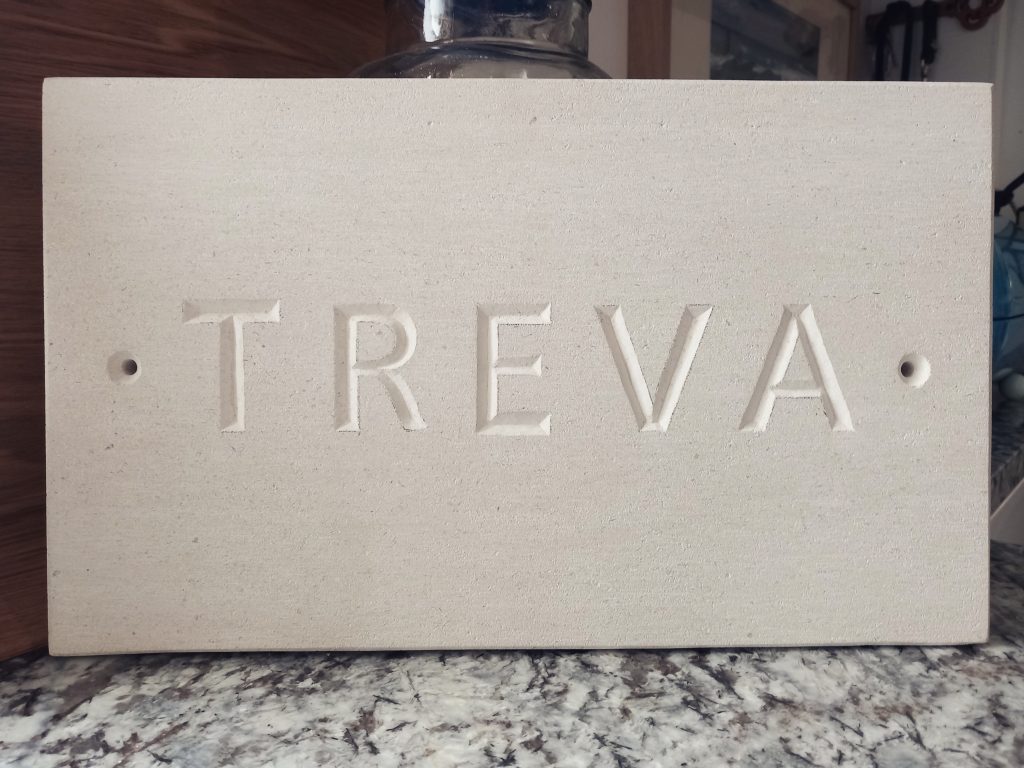 Traditionally carved house sign name TREVA in Portland stone especially for you