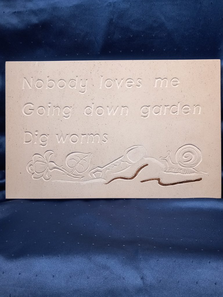 Portland stone hand carved with inscription and rellief carved illustration